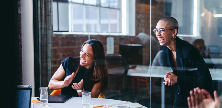 Happy business team working together.