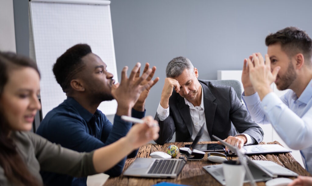 Conflict resolution in the workplace - team disagreement