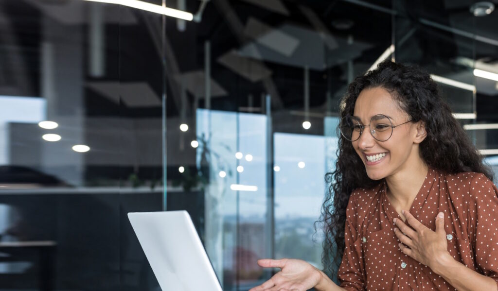 Woman discussing her OKRs online with her manager.