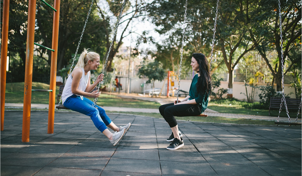 Two women taking time out to discuss their professional development