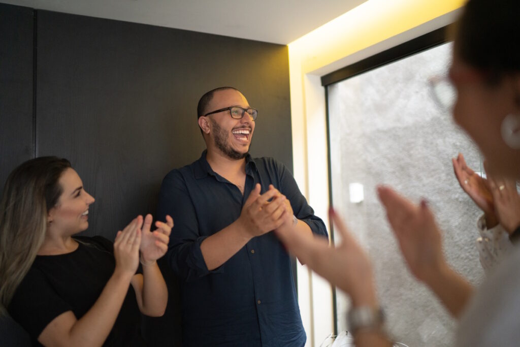 Team celebrating together: team motivation that is working