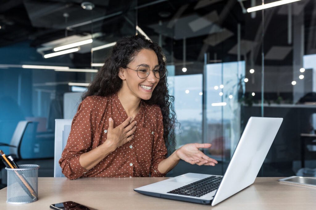 Woman engaged in an AI coaching session.