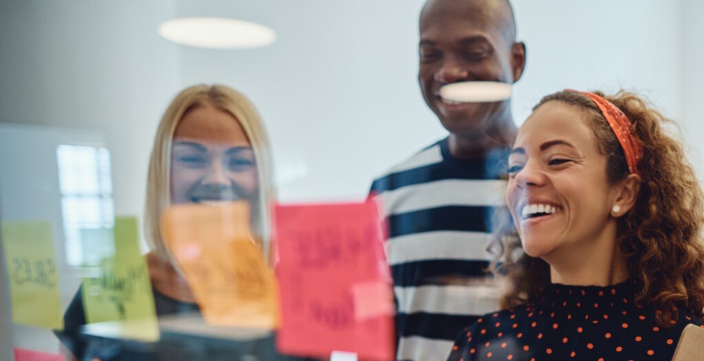 Diverse team engaged in systemic team coaching